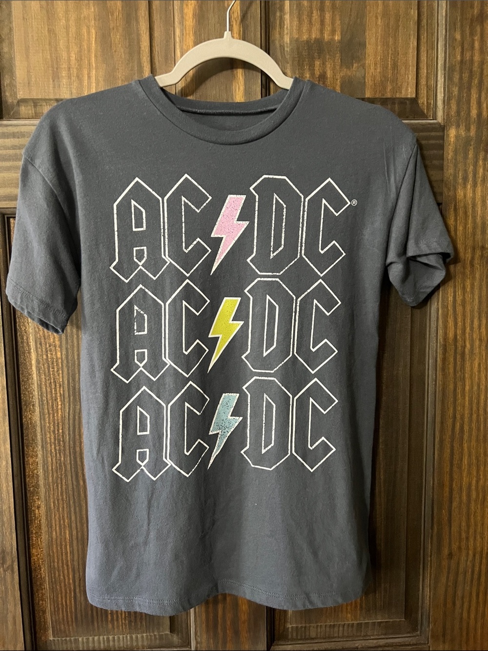 AC/DC Kids Short Sleeve Tee in Charcoal with Pink, Yellow & Blue Lightning Bolts